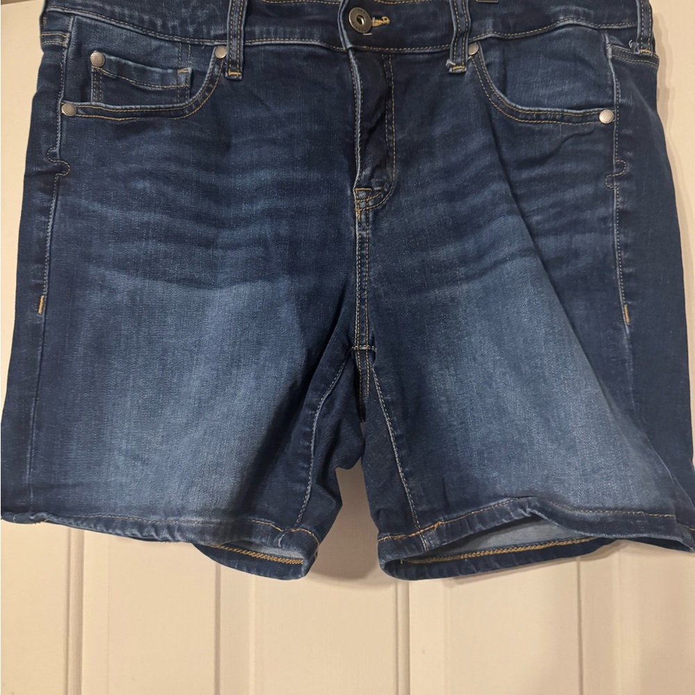 torrid dark blue denim shorts with gold stitching